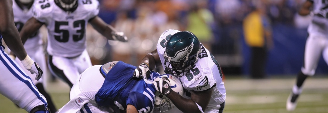 Josh Gaines making a tackle in a pro game